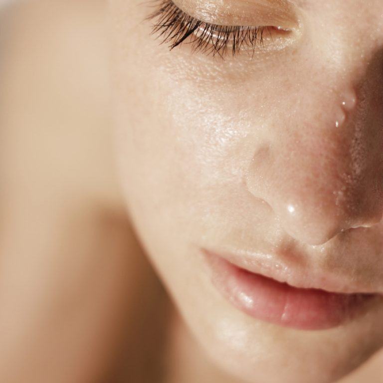 Close-up,Of,Beautiful,Wet,Woman,Face,With,Water,Drop.